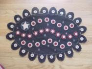 Primitive wavy flag penny rug mat