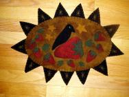 Strawberry and crow penny rug